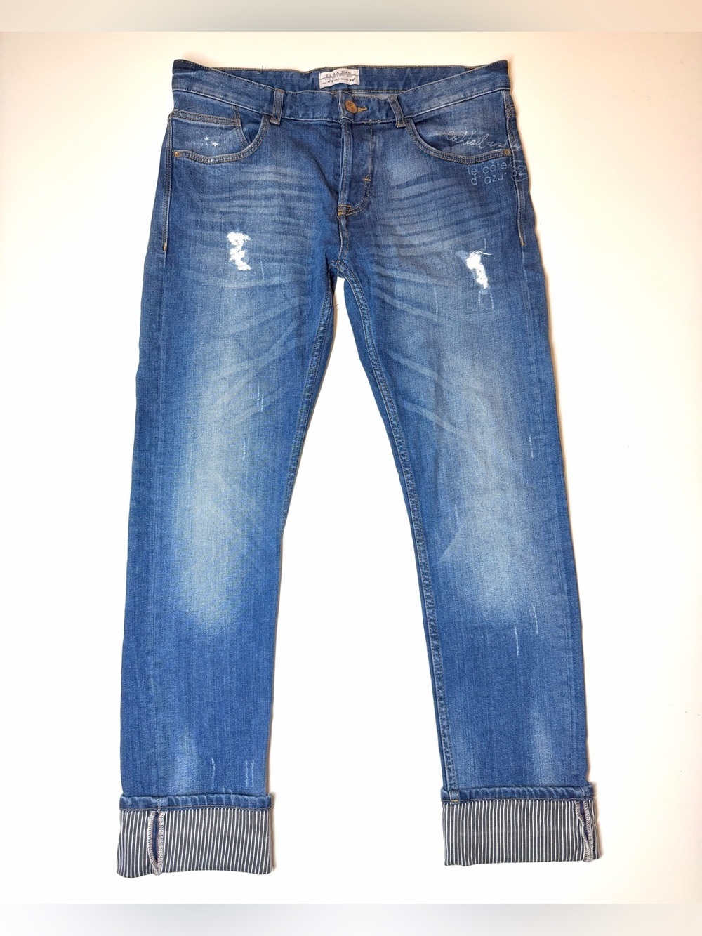 Zara Man distressed blue jeans feature unique striped cuffs Size- 34
